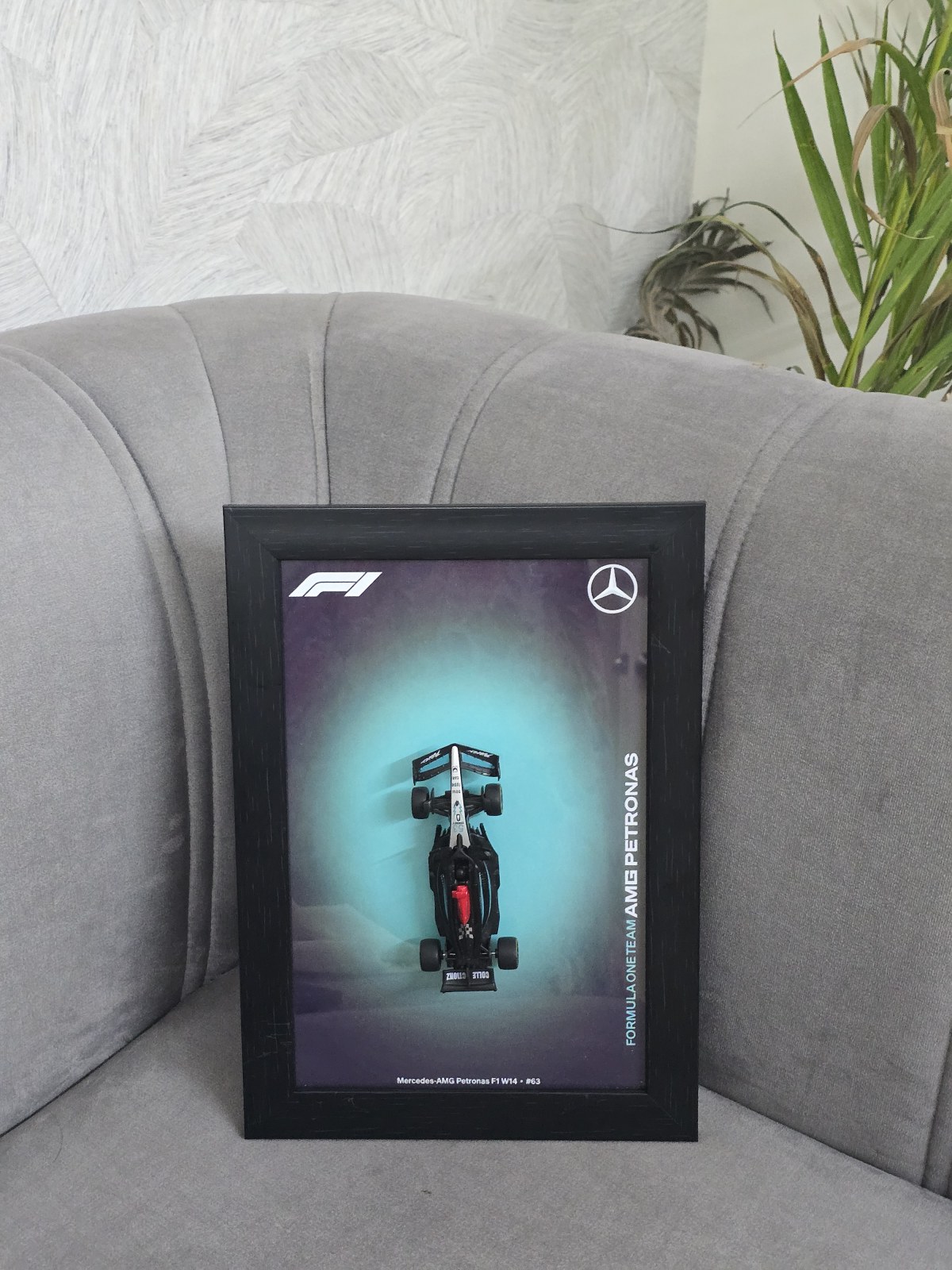 Mercedes-AMG Petronas F1 in Matte Black — scale model in a shadow-box frame with an engraved plaque